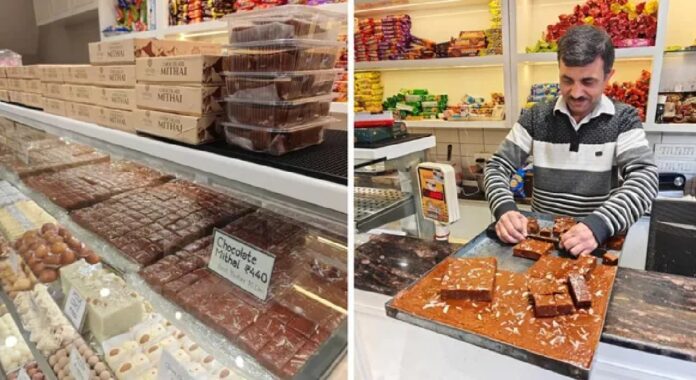 Lansdowne: Nestled in the serene cantonment town of Lansdowne, this quaint hill station is renowned not only for its colonial charm, pine-scented air, and panoramic Garhwal Himalayan views but also for a unique sweet treat that has stood the test of time for over 138 years—the iconic Lansdowne Chocolate Mithai. Unlike conventional chocolate, this is a traditional milk-based fudge-like sweet made from khoya (mawa), sugar, and desi ghee. Its rich, caramelized chocolate-brown color and melt-in-the-mouth texture have made it an irresistible souvenir for almost every visitor. Rarely does a tourist leave Lansdowne without tasting or packing this delicacy. The sweet enjoys cult status among locals, tourists, and especially the soldiers of the Garhwal Rifles Regiment, whose regimental centre is headquartered here. During passing-out parades, oath ceremonies, and regimental events, Garhwal Rifles personnel and families from across Garhwal districts share boxes of Lansdowne Chocolate as a symbol of joy and pride. Jawans on leave never forget to carry it home for their families. According to Purushottam Mishra, manager of Mishra Sweets—one of the oldest and most popular shops in town—the craze remains undiminished even after more than a century. “Every tourist who comes for sightseeing ends up falling in love with the taste. Once they try it, they become fans,” he says. The origin story of Lansdowne Chocolate is intertwined with the town’s British colonial history. Founded in 1887 and named after the then Viceroy of India, Lord Lansdowne, the town had no motorable roads in its early days. British officers, soldiers, and local residents traveled on foot for days. In that era, conventional milk-based sweets like peda or barfi spoiled within two or three days during the arduous journeys. There was a need for a longer-lasting sweet—something that could remain fresh for at least 10–15 days while offering a distinct and delicious flavor. Local halwais experimented by slow-cooking khoya, sugar, and ghee on a low flame for an extended period, constantly stirring the mixture in a kadhai. After prolonged cooking (around 40–45 minutes), the mixture transformed into a glossy, deep chocolate-brown hue. Inspired by the color, they named it simply “Chocolate.” During the British period, the sweet became extremely popular among officers, who often presented it as gifts to their superiors. Recognizing the demand, the British encouraged local confectioners to produce it in larger quantities. Interestingly, at the time, Lansdowne Chocolate was preferred over Almora’s famous Bal Mithai, which was coated with sugar-coated poppy seeds (khuskhus) that made it overly sweet. The British favored the balanced sweetness and longer shelf life of Lansdowne’s version. In earlier decades, surrounding villages practiced large-scale dairy farming, producing abundant milk and khoya. The rising demand for Chocolate Mithai boosted khoya sales, creating a mutually beneficial economy: villagers earned a steady livelihood selling khoya, while sweet shops enjoyed a reliable supply and strong business. The preparation remains traditional even today. Khoya, sugar, and pure desi ghee are combined in precise proportions and slow-cooked with continuous stirring to prevent burning. The process takes 40–45 minutes on controlled heat until the mixture achieves its signature chocolate color and fudgy consistency. Some modern variants add roasted dry fruits (almonds, cashews, pistachios) for a premium “Dry Fruit Chocolate” version. A few shops also experiment with subtle additions like cocoa or coffee powder to enhance flavor, though purists stick to the classic recipe. Despite competition from confectioners in nearby Kotdwar and other towns who now market their own versions under local brands, authentic Lansdowne Chocolate remains the gold standard. Tourists and locals unanimously agree that the original taste from Lansdowne shops is unmatched. Priced affordably (around ₹380–450 per kg as of recent years), this simple three-ingredient sweet continues to be a symbol of Lansdowne’s heritage. It represents not just a culinary delight but a living link to the town’s colonial past, local economy, and unbreakable bond with the Garhwal Rifles. So, the next time you visit the peaceful cantonment of Lansdowne, don’t miss the chance to savor—or take home—a piece of its timeless chocolate legacy. One bite, and you’ll understand why this sweet has survived 138 years and counting.